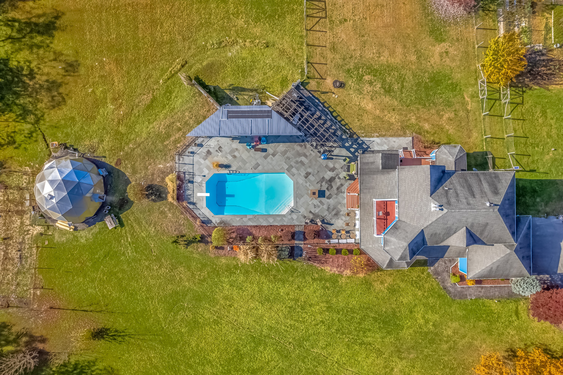 Overhead view of the pool, patio and geodesic dome